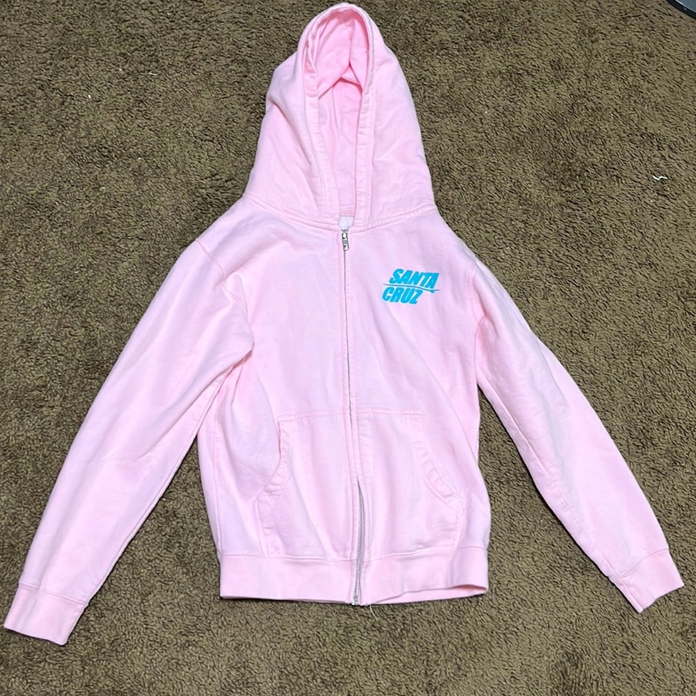 Pink Santa Cruz jacket.